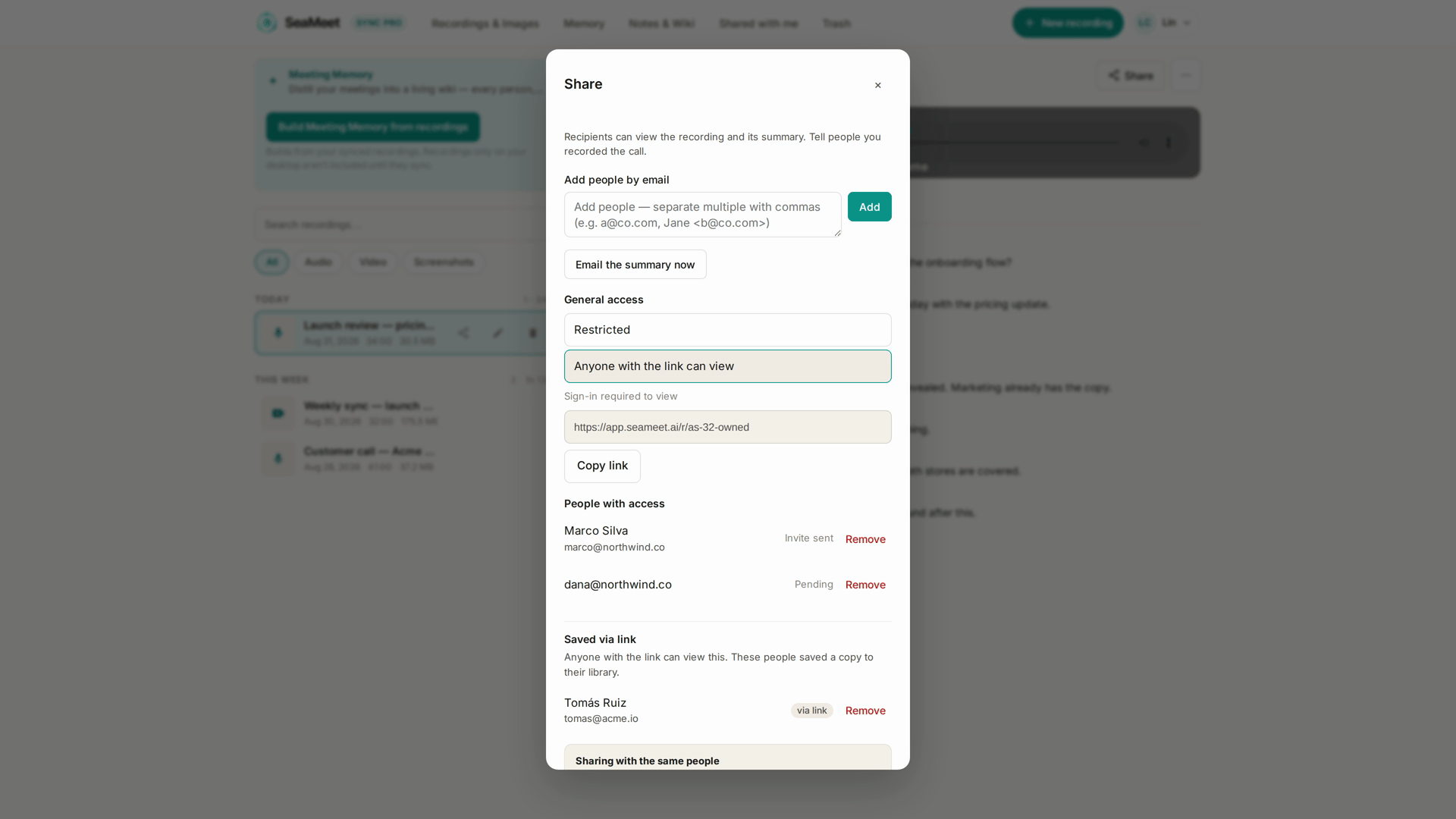 The Share dialog: people added by email, link access set to anyone with the link, and the note that viewing needs a sign-in