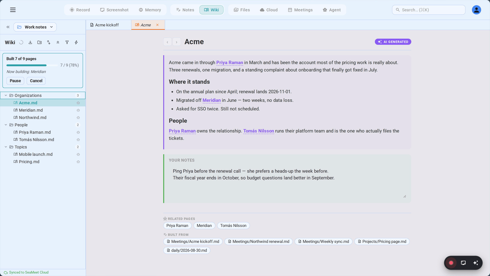 Building the wiki from a folder of notes: the progress banner counting through the corpus while the pages appear in the tree beneath it